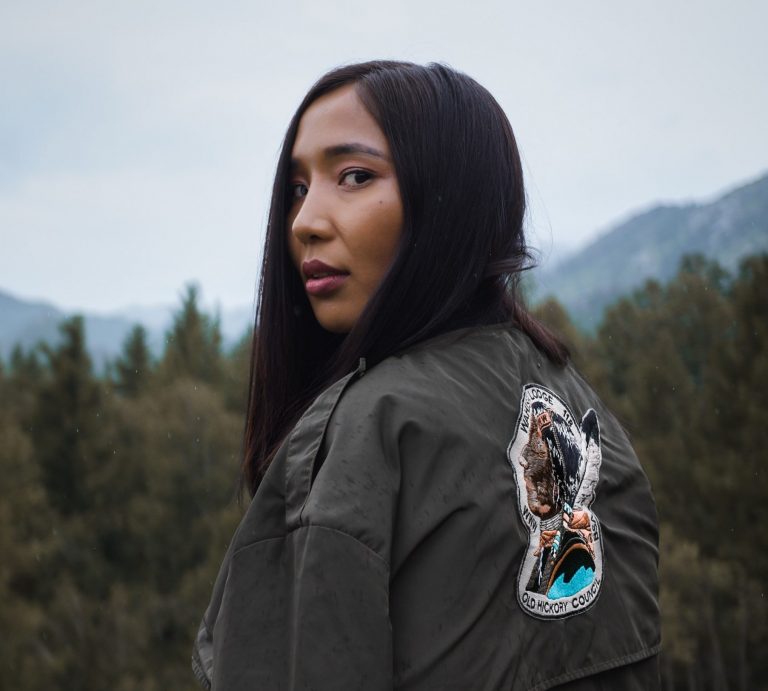 native american woman in the woods